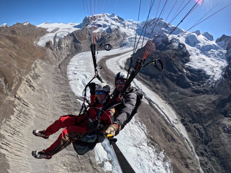 paragliding over glacier